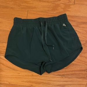 Green athletic shorts
